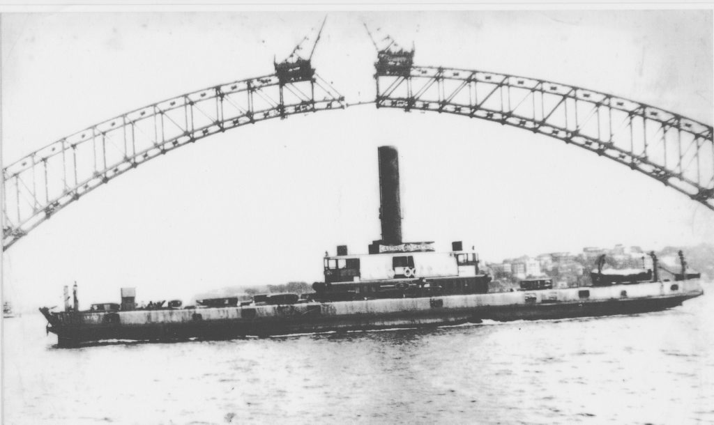 The Sydney Harbour Bridge under construction. The Sydney Harbour Bridge under construction.